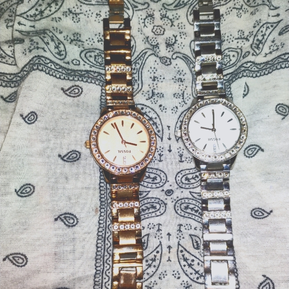 2 women's fossil watches ,$75 each or $130 for both.